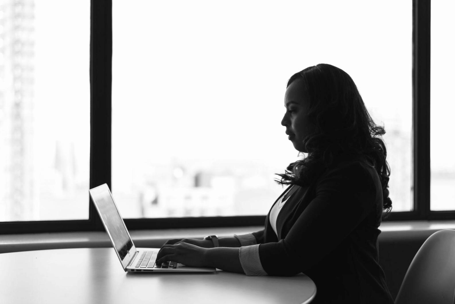 Modern office workspace with computers and trading session equipment